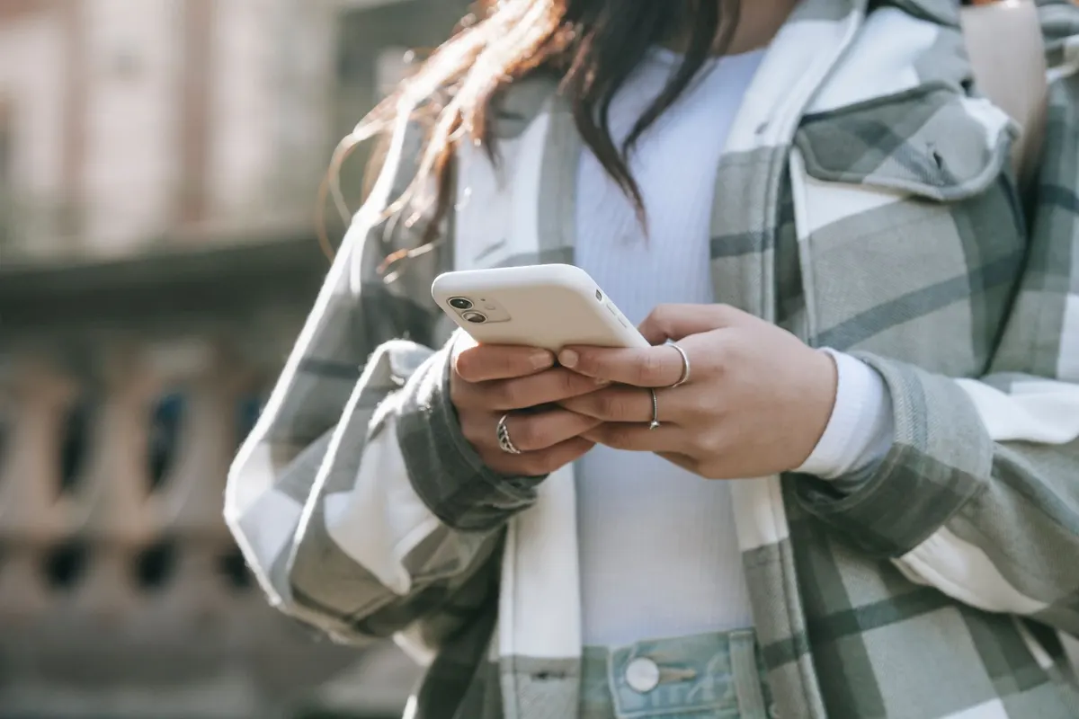 Person checking information on a phone