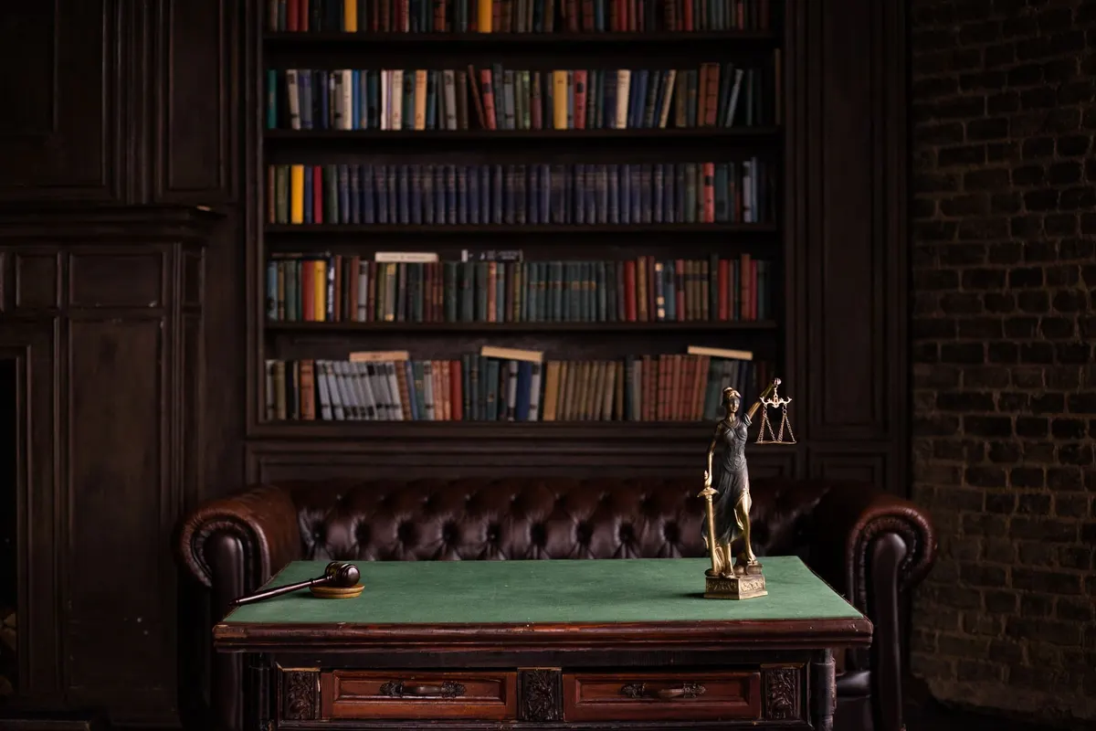 Gavel and law book representing legal compliance