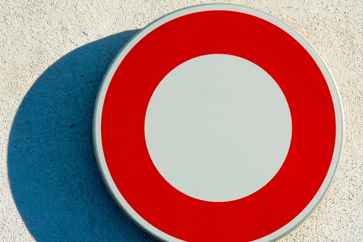 Warning sign highlighting a red flag